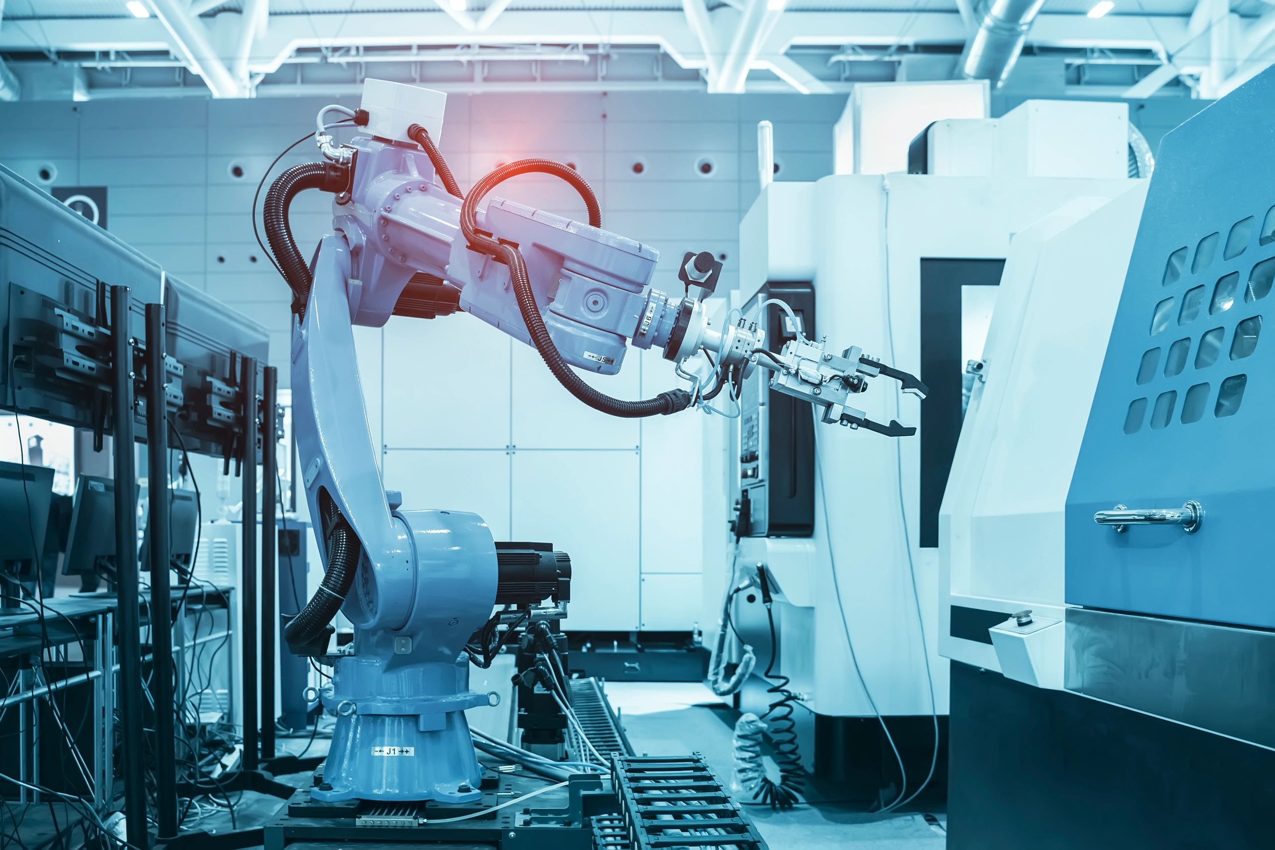 industrial robot arm in manufacturing